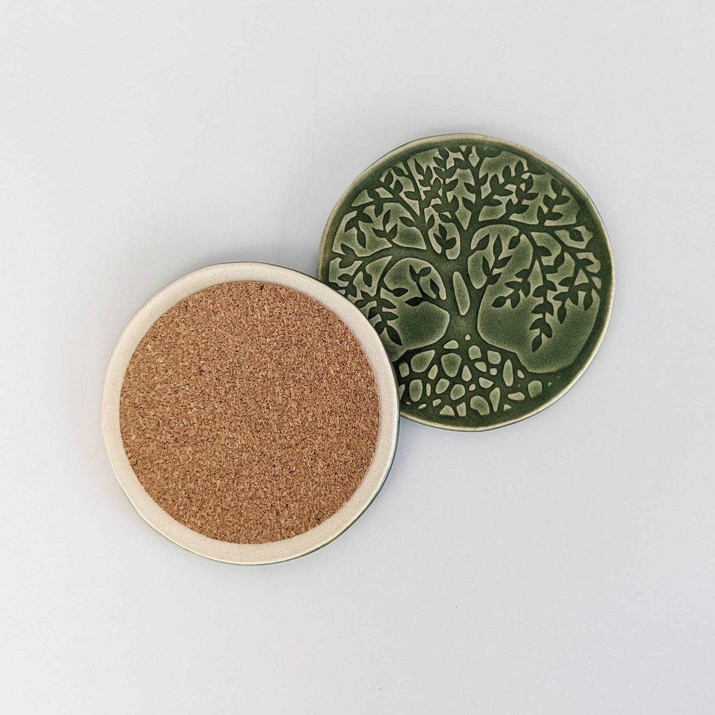 Unique ceramic coasters lined with natural cork for surface protection