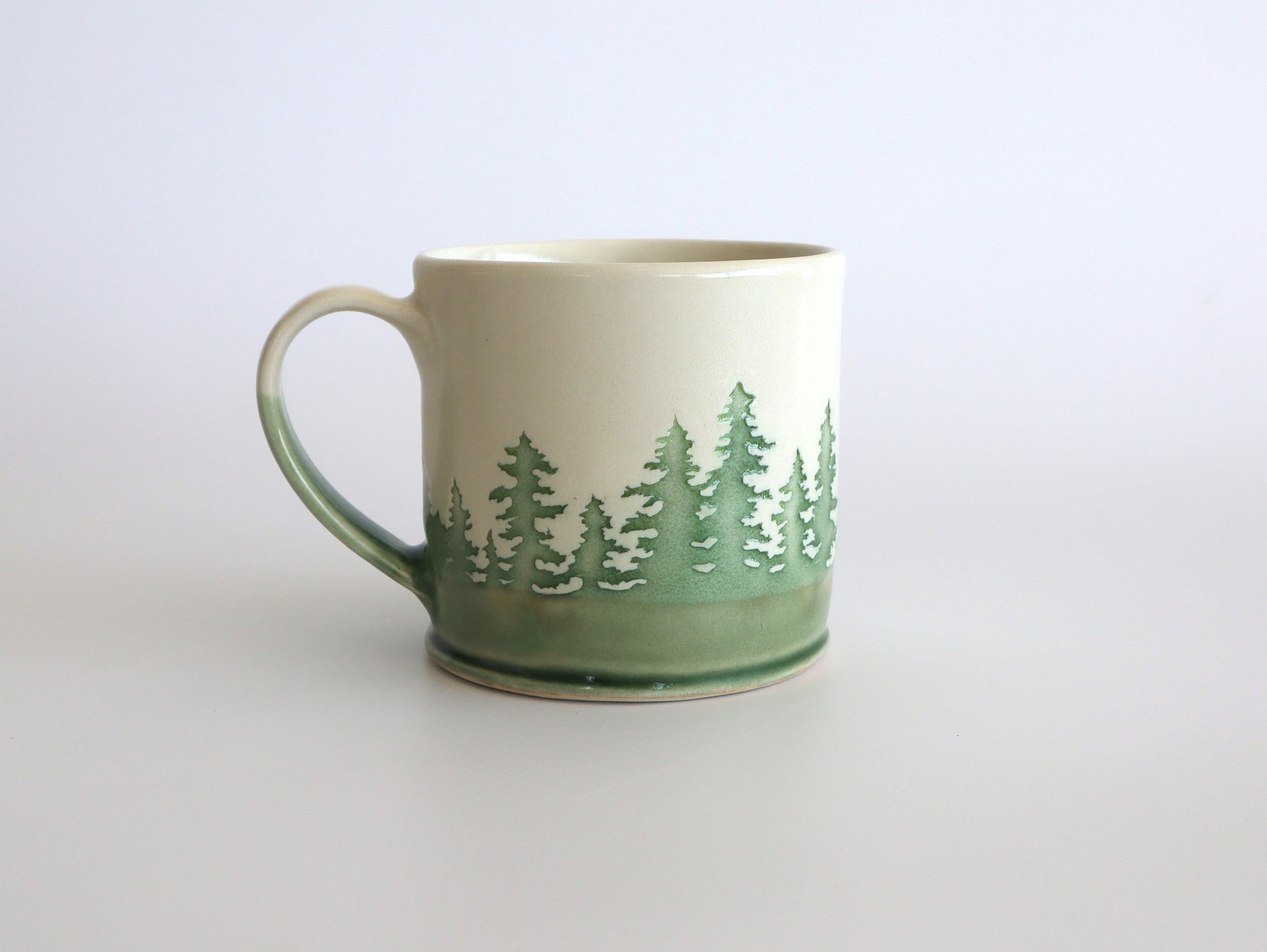 Artistic coffee mug inspired by Canadian landscape