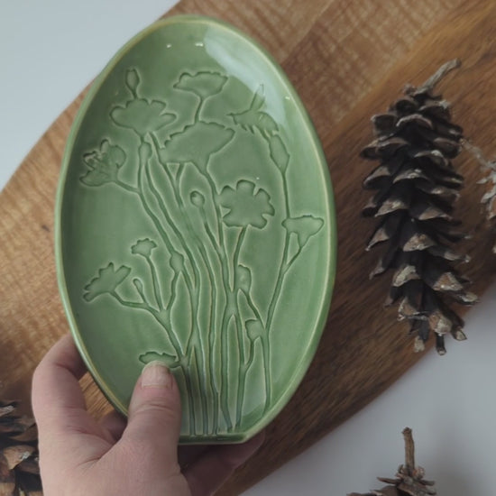 Green Spoon Rest made of Canadian porcelain with a delicate Poppy Flowers and Bee motif. Artisan work.