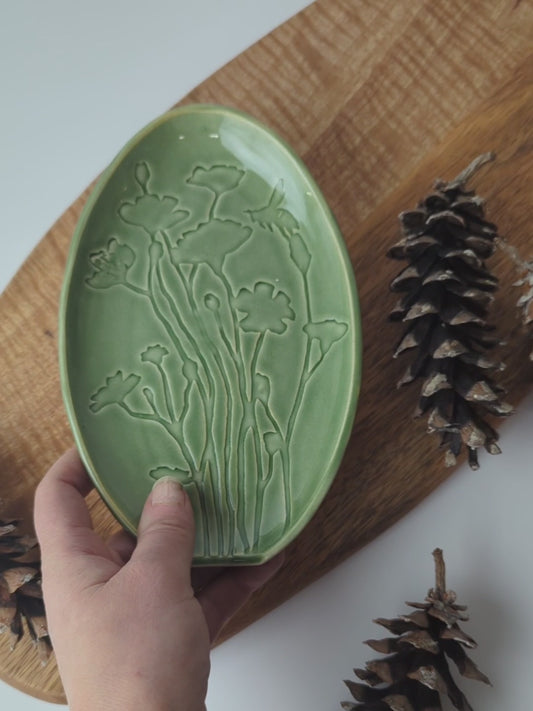 Green Spoon Rest made of Canadian porcelain with a delicate Poppy Flowers and Bee motif. Artisan work.